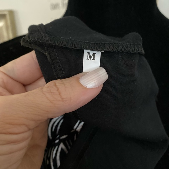 Sun and moon cropped black halter top. - Picture 7 of 7